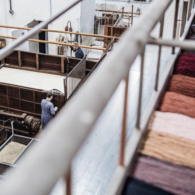 Wool processing plant Industrial wool processing with workers (ID#3)